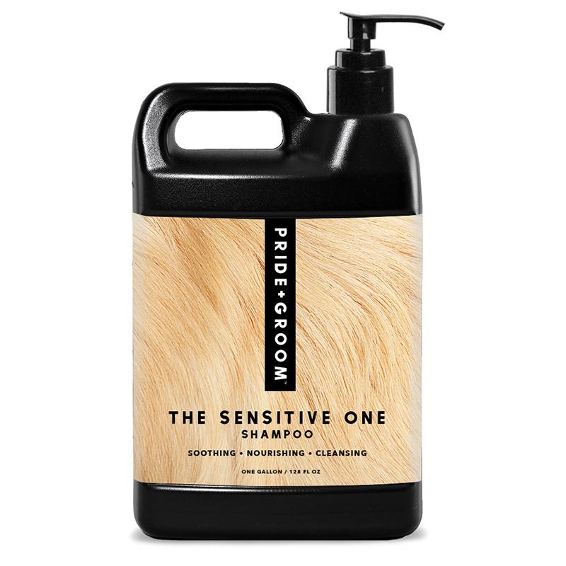 PRIDE+GROOM THE SENSITIVE ONE dog shampoo large pump bottle, full-size product on dark background